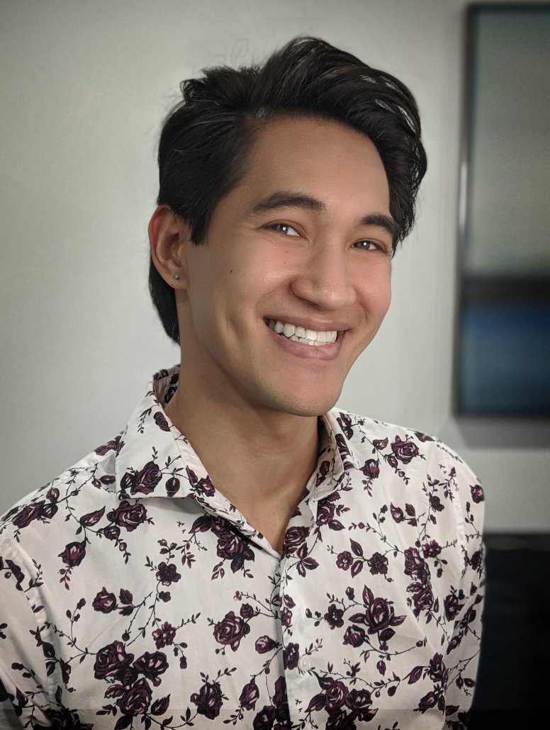 A photo of Christophe Ngo, a Licensed Marriage and Family Therapist and the owner of BeachCAT Counseling in California, is smiling and ready to help people looking for mental health therapy treatment.